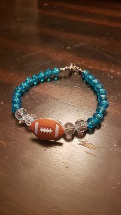 Turquoise and clear football bracelet