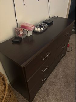 Dark brown/slight cherry wooden dresser