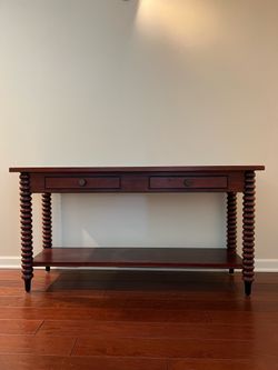 Lovely spool leg console table