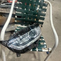 13-16 Ford fusion. Driver head light