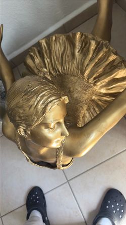300 pounds of bronze painted gold for better looks