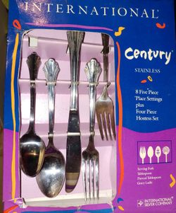 International Silver 44 piece stainless steel flatware (brand-new)