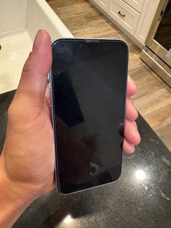 Apple iPhone 14 with case and screen protector