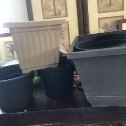 4 Medium To Large Plastic Pots 