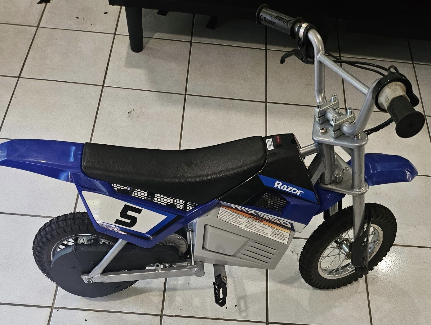 Razor Dirt Rocket MX350 - Black with Decals, up to 14 mph, 24V Electric Dirt Bike for Child