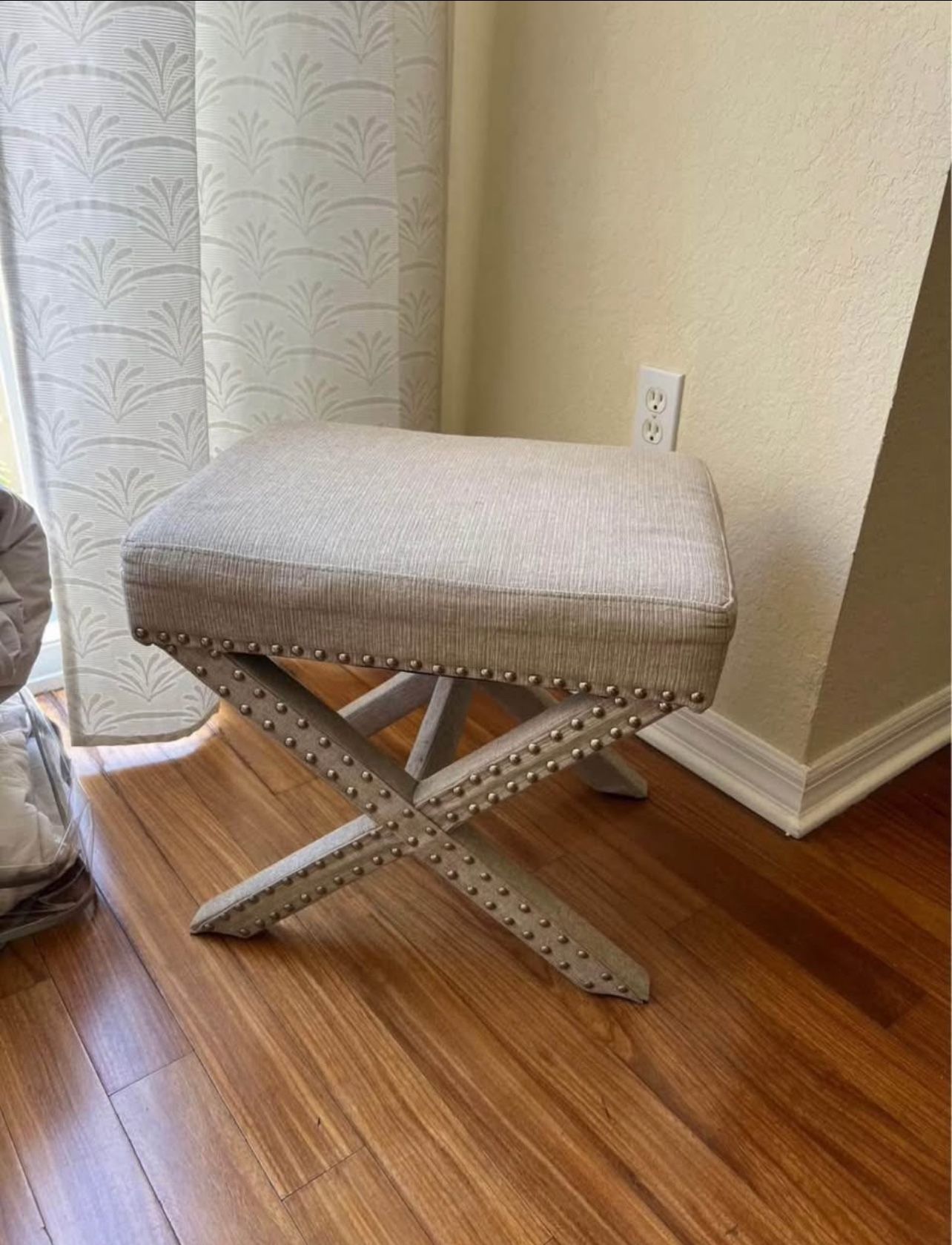 Elegant Beige Upholstered Stool with Nailhead Trim