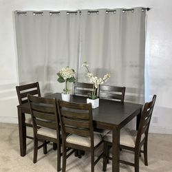 Handsome Ashley Furniture Dining Table With 4 Chairs & Seat Covers For Versatility!