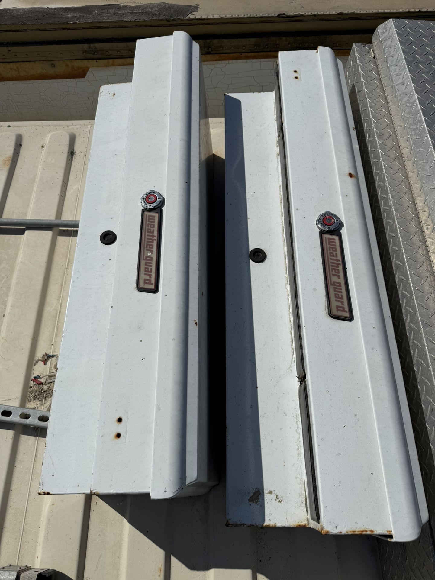 Two Steel Weather Guard Side Mount Tool Boxes