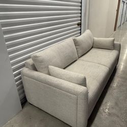 Light gray sofa bed with herringbone pattern - 218 cm wide