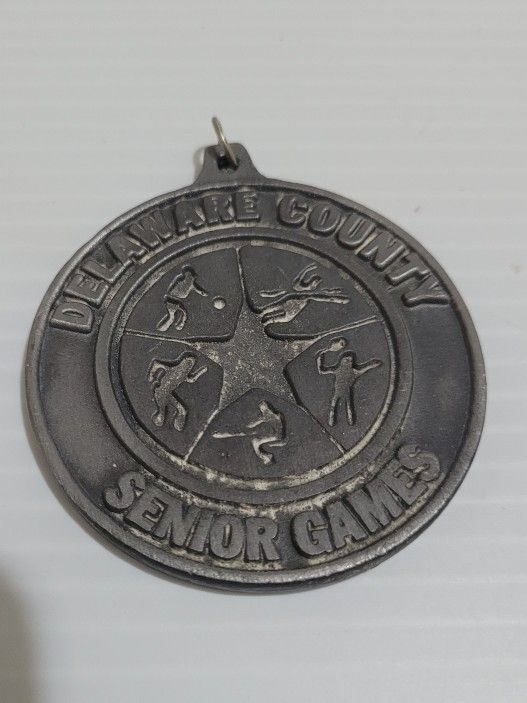 State Senior Games Delaware County Grey Medal Metal 2".

