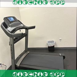 Life Fitness Treadmill - Gym-Standard Workout Machine car behind