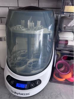 Baby Breeza bottle of water & sanitizer