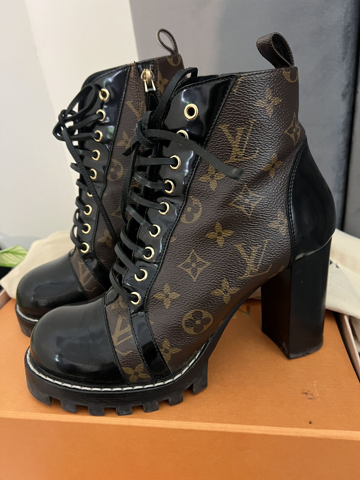 lv boots and gucci heels