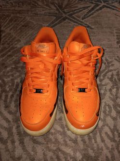 Nike Air Force 1 Orange Low-Top Sneakers
