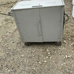 Vintage Metal Cabinet With 3 Shelves And 2 Spaces On Top With Table And Bar On Wheels 