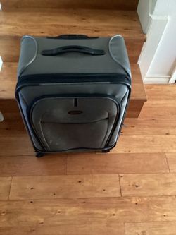 Samsonite  Luggage./ Suitcase(.Grey) Dimensions are;  17”W— 10”D — 26”H.