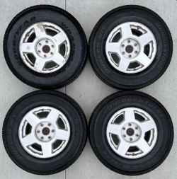 Set of 4 - 17" Chevy 6-Lug Wheels with P265/70R17 Tires - Goodyear & Bridgestone