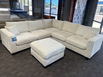 Cream L shaped sectional and ottoman
