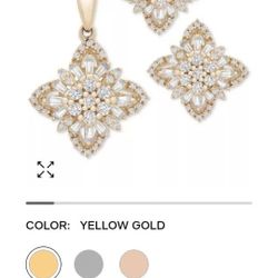 14 K Gold Flower Cluster Set Plus Another Set Of Diamonds Earrings With Black Gem Center Piece.
