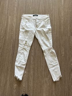 Express Women's white distressed skinny jeans