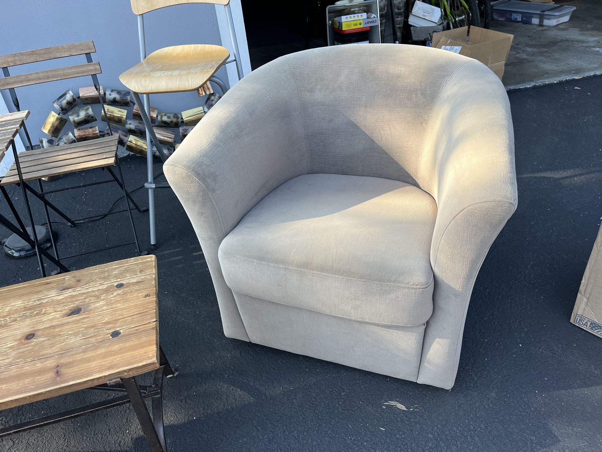Gray swivel armchair