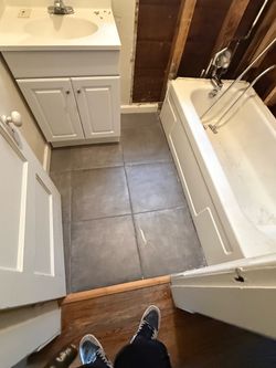 25 in single sink vanity with faucet.