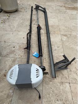 Garage opener motor with rails and control