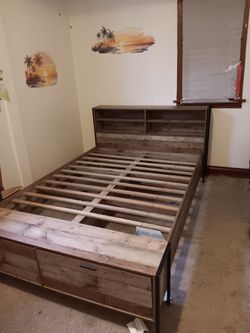 Queen bed frame with bookcase and storage/ No box spring needed.