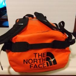 NEW The North Face Base Camp Duffel Bag Backpack 132L Orange - Size XL. 