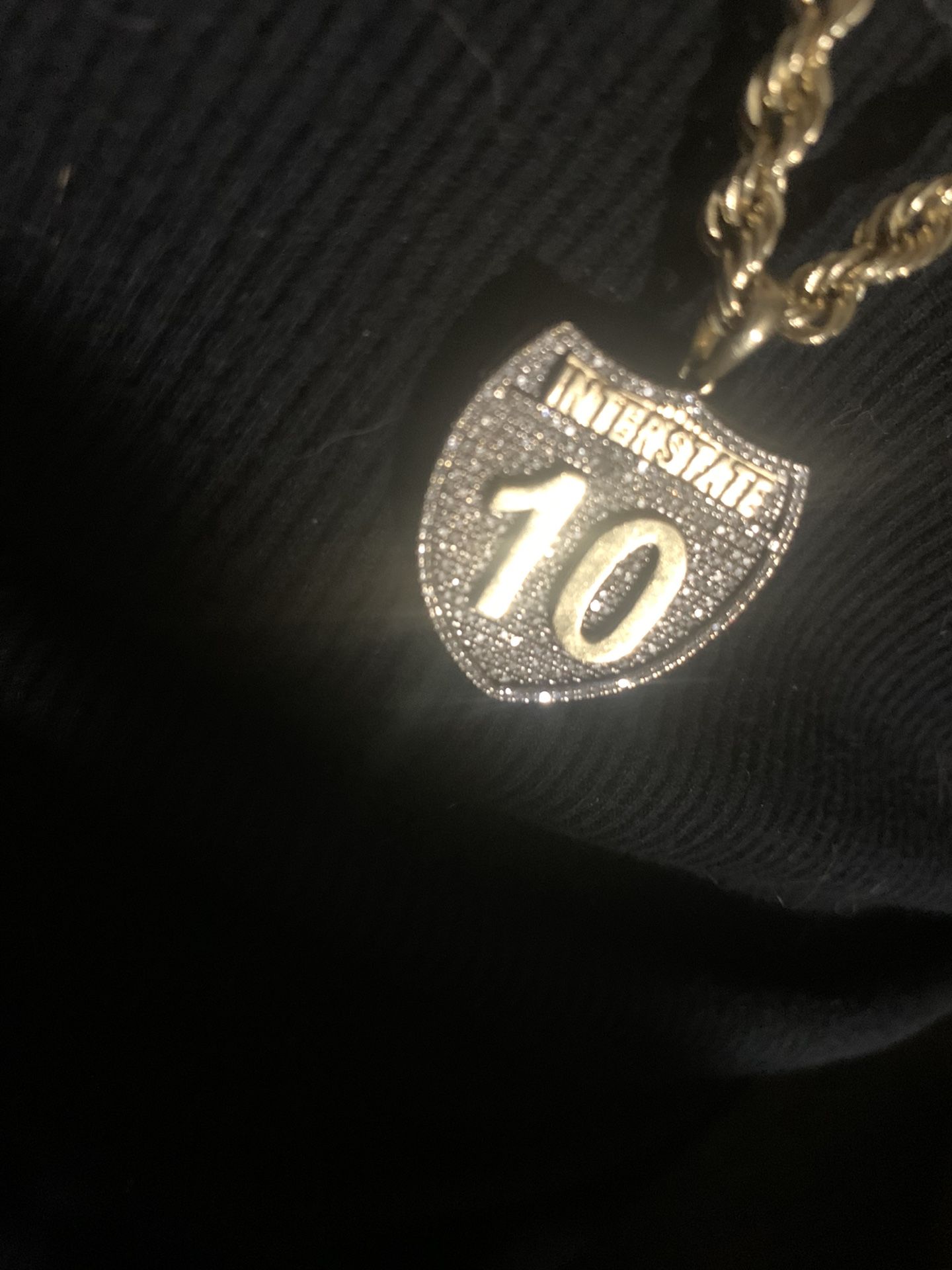 I-10 diamond pendent with yellow gold rope chain