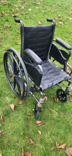 Folding 16" Wheelchair Holds 250 Lbs. No Foot Rests