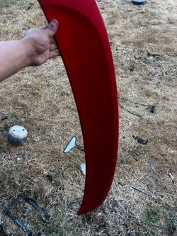 Red Curved Car Body Panel Trim Piece