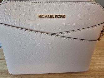 Micheal worse jet travel medium dome crossbody