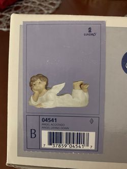 Lladro Angel Laying Down