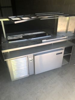 Refrigerated serving table. Will deliver.