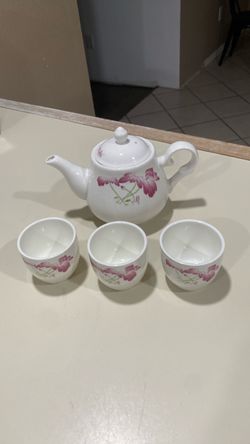 White Ceramic Tea Set with Floral Design