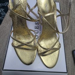 8 1/2 New gold Guess Heels 