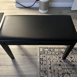 Piano bench with padded cushion and music storage