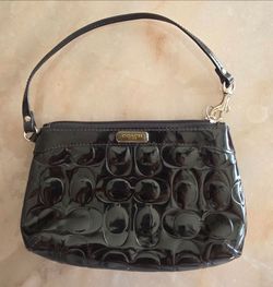 Coach wristlet black.