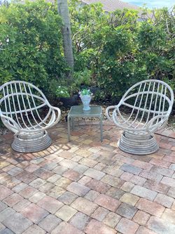Vintage swivel rattan chairs