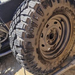 All Terrain Tire Like New It's 2021 I Think  R15 ,31,10,50. Rim Not Not Included It's On So You Can See It's Good It Holds Air