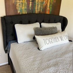 Brand new Queen Size grey linen upholstered platform bed frame.