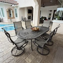 TROPITONE DINING TABLE WITH 6 ROCKER CHAIRS   (BEST OFFER)