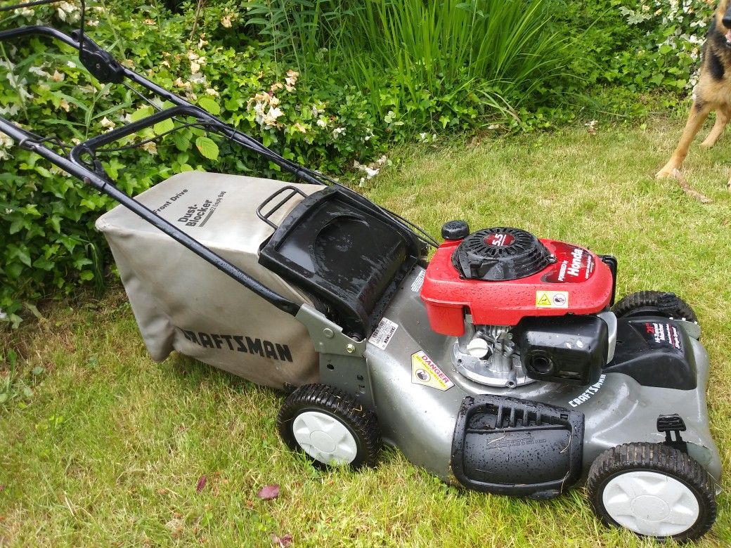 Honda powered Craftsman 21" lawnmower Hi-Tunnel Mulcher, 5.5hp engine w/bag