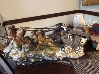 Ceramic horse and carriage figure leather