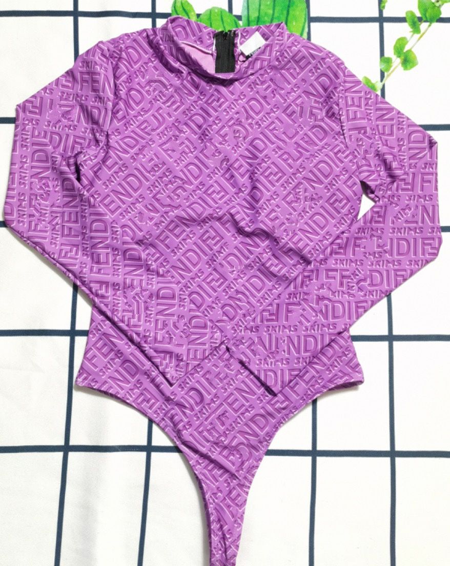 High Fashion Design Women’s Size Small Bodysuit