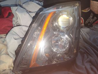 headlights 2012 Cadillac CTS coupe