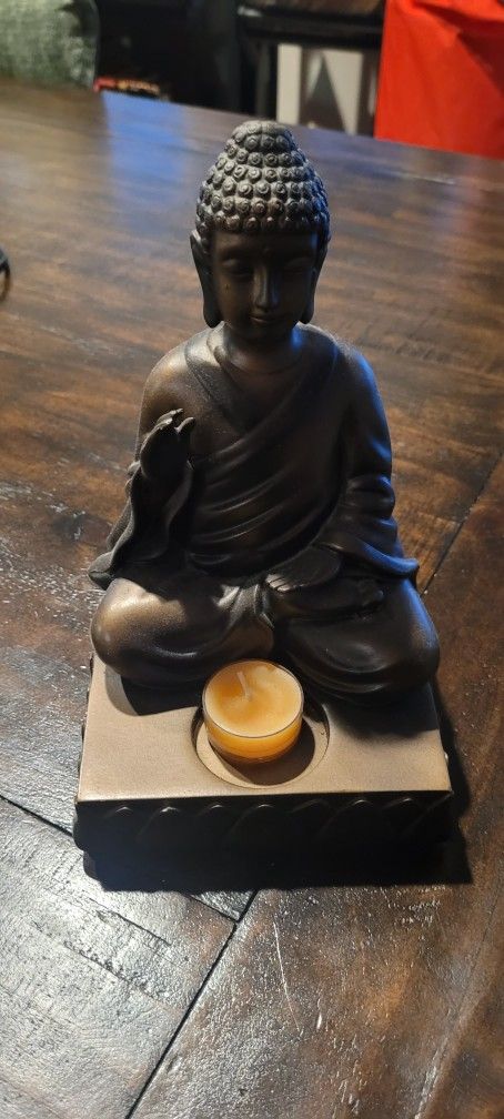 Buddha With Candle