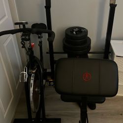 Exercise Bike And A Workout Bench 