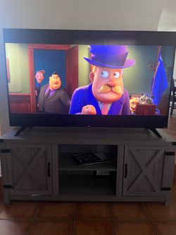 55” TV  Roku and Tv Stand